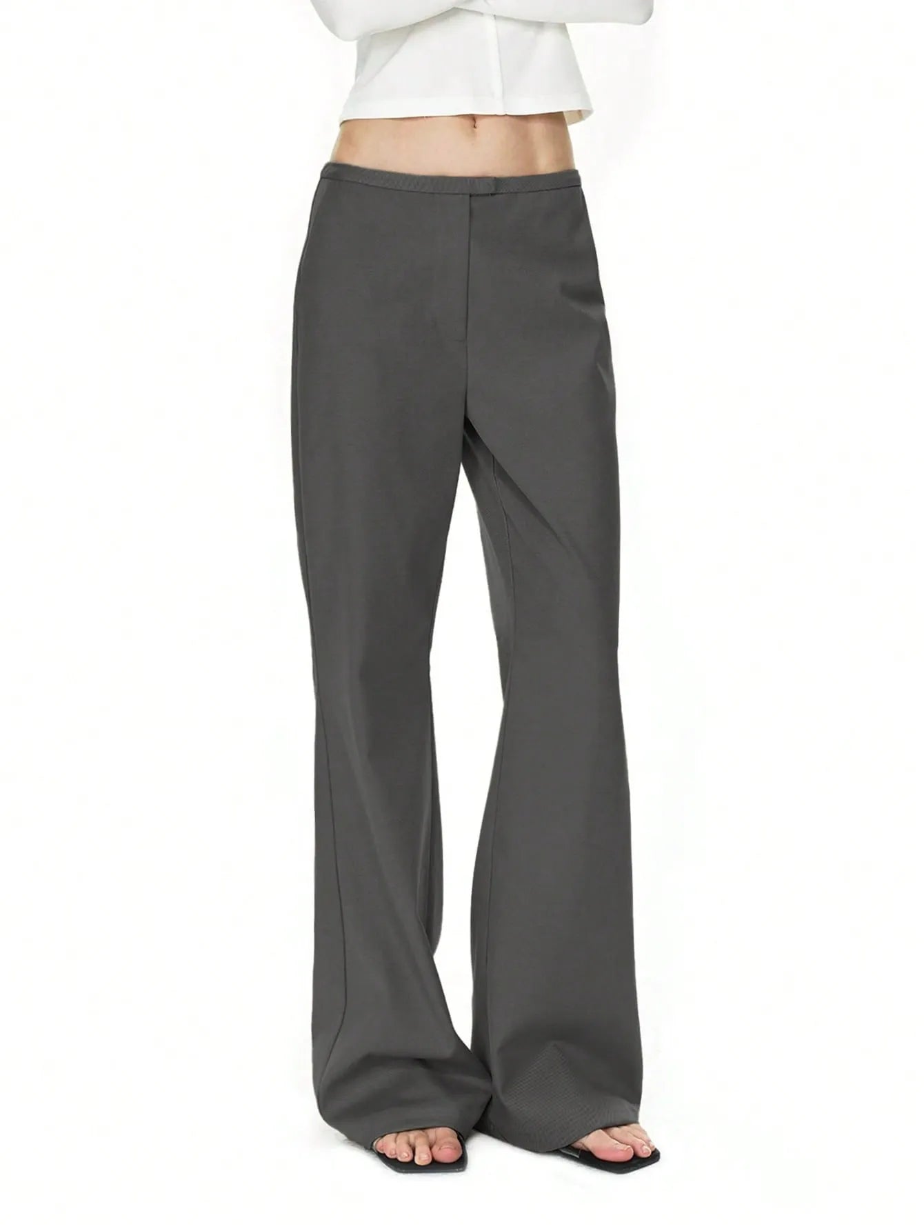 High waist flare leg trousers with buttons and pockets.