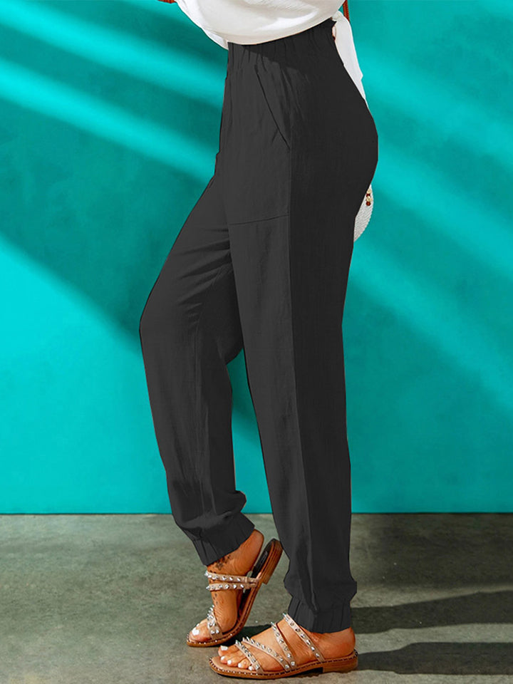 High waist joggers with pockets, casual style.