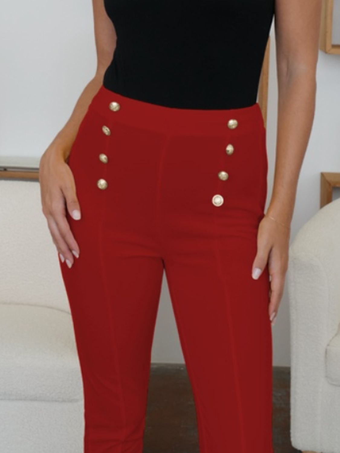 High waist skinny pants with decorative buttons, opaque.