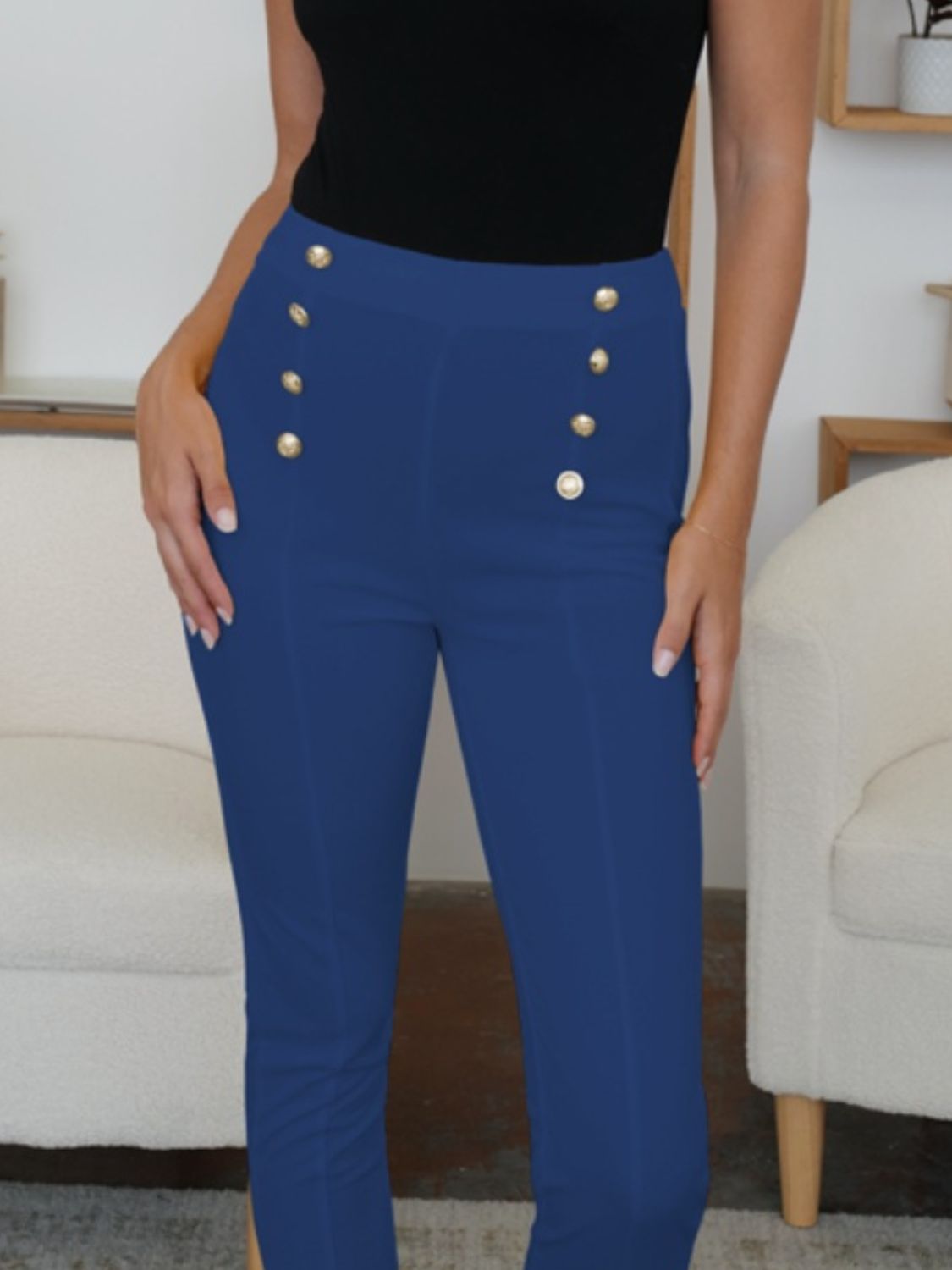 High waist skinny pants with decorative buttons, opaque.