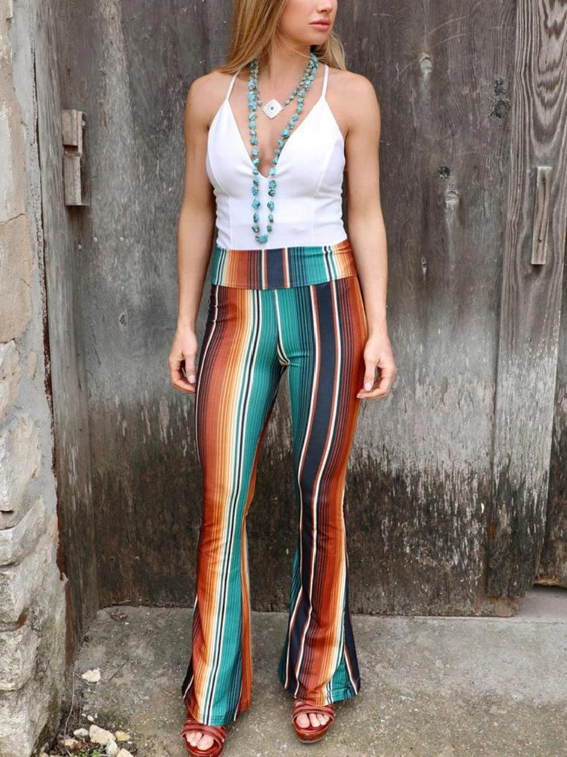 High waist striped bootcut pants, opaque.