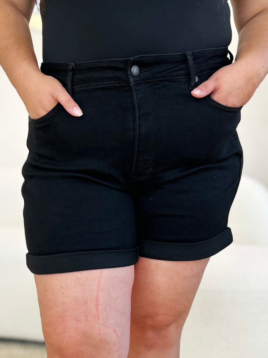 High-waist utility pocket denim shorts.