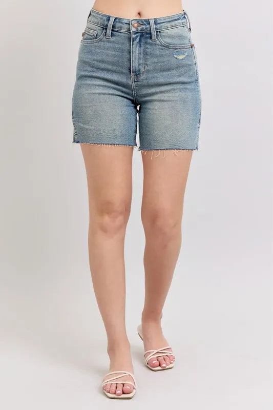 High-waist washed denim shorts with pockets.