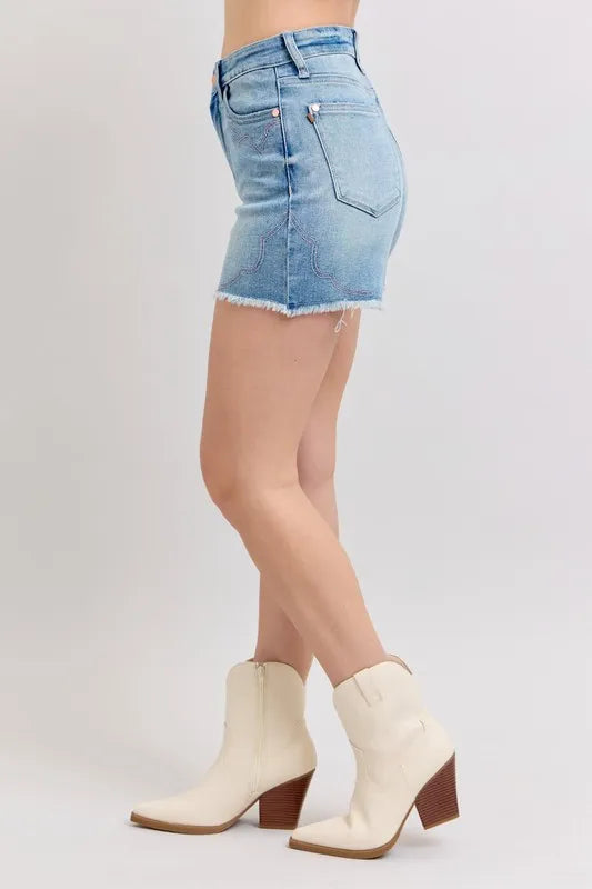 High-waisted denim shorts with roll-up option.