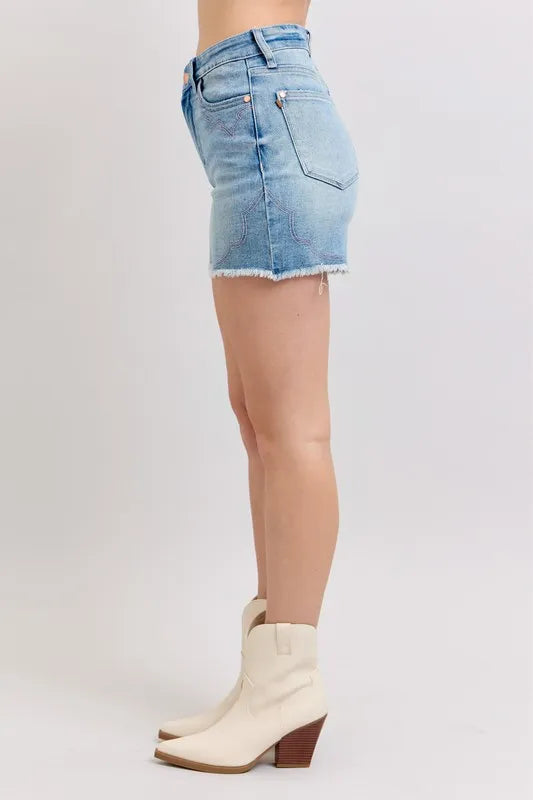 High-waisted denim shorts with roll-up option.