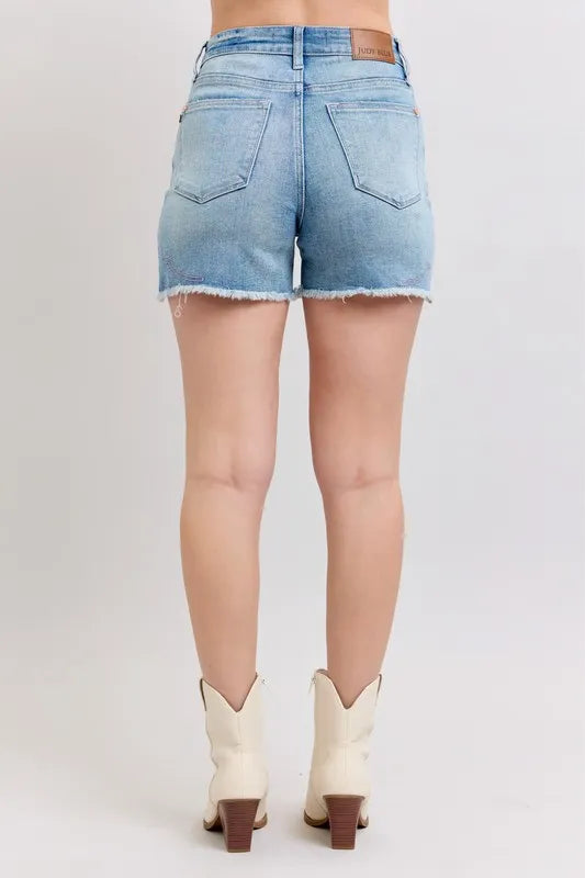 High-waisted denim shorts with roll-up option.
