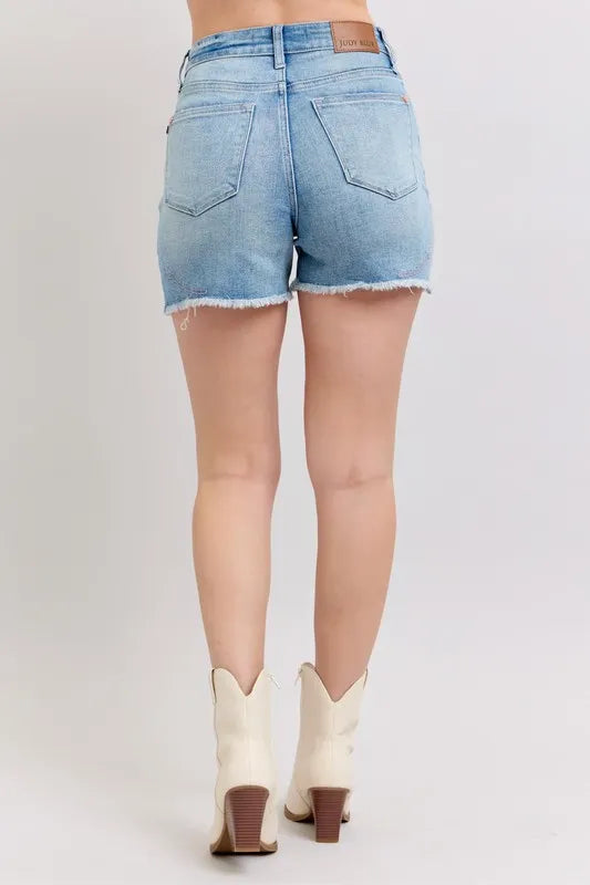 High-waisted denim shorts with roll-up option.