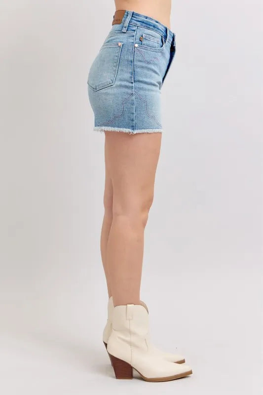 High-waisted denim shorts with roll-up option.