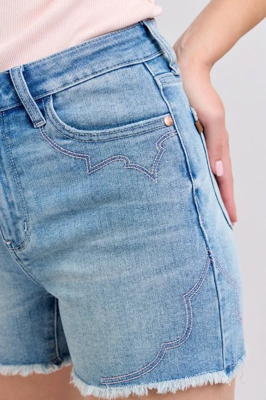 High-waisted denim shorts with roll-up option.