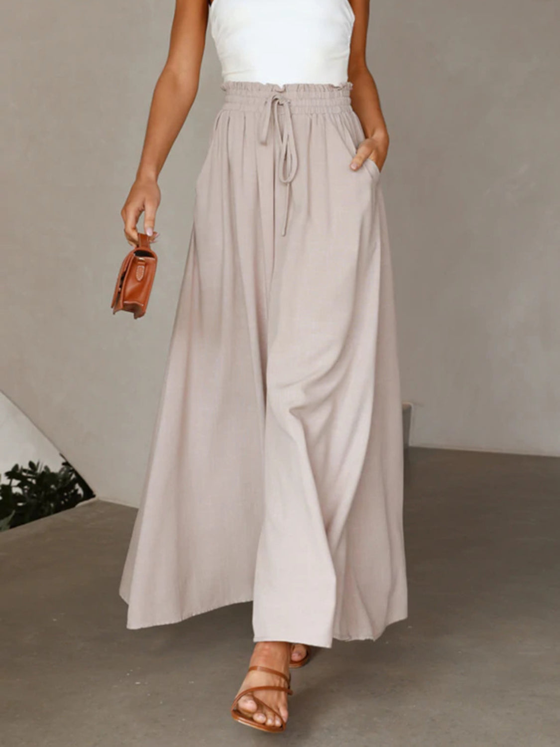 High waist wide leg pants with pockets, opaque.