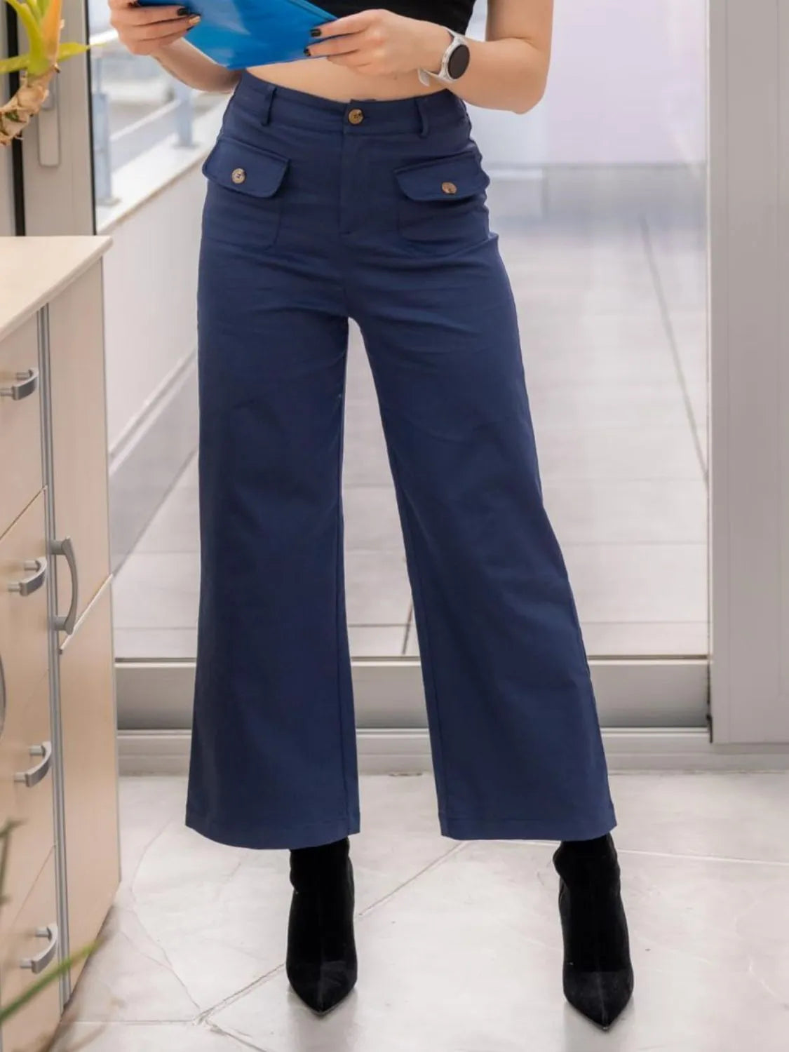 High waist wide leg pants with buttons and pockets.