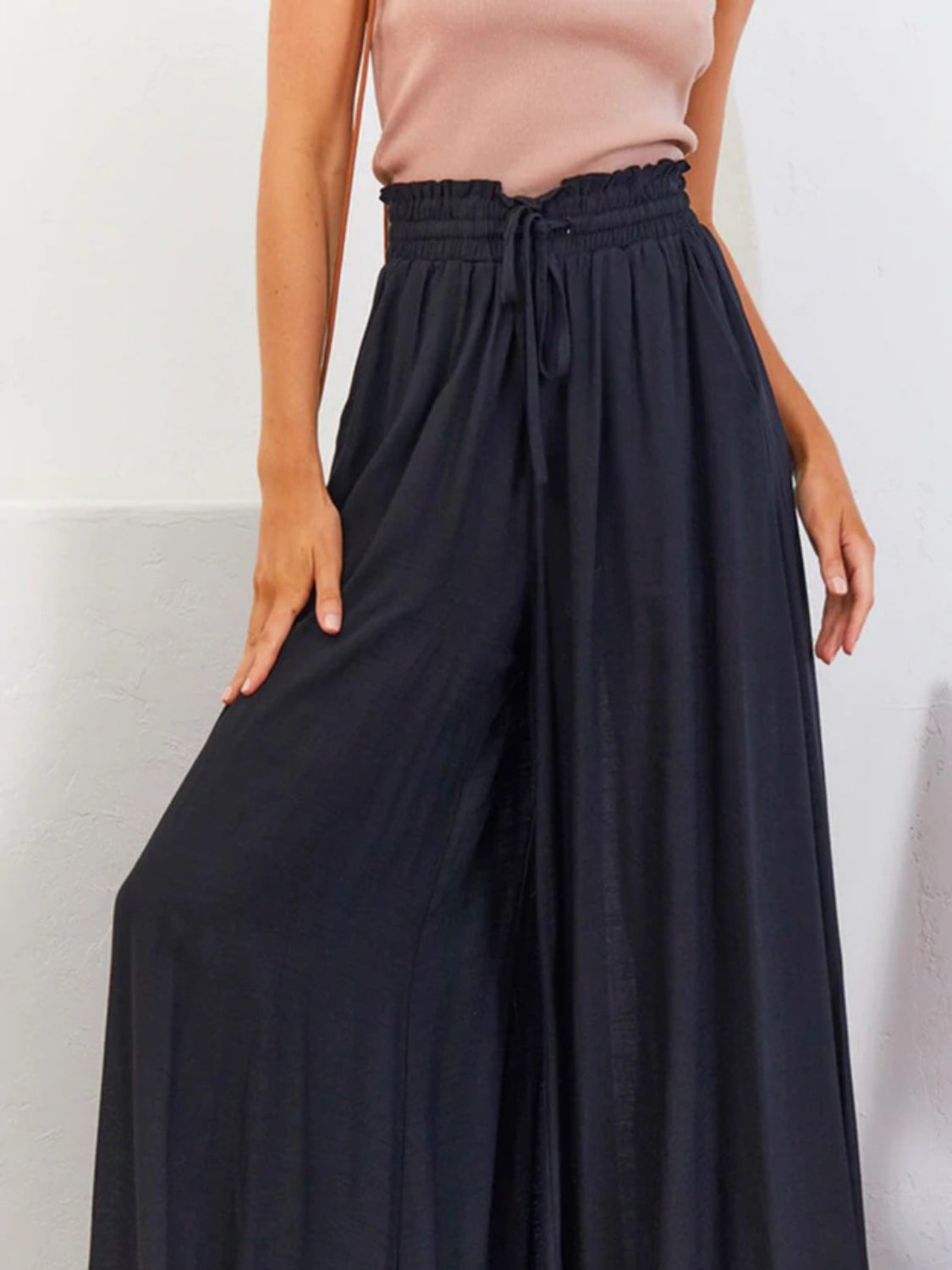 High waist wide leg pants with pockets, opaque.