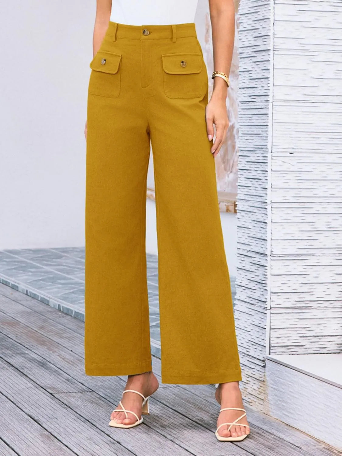 High waist wide leg pants with buttons and pockets.