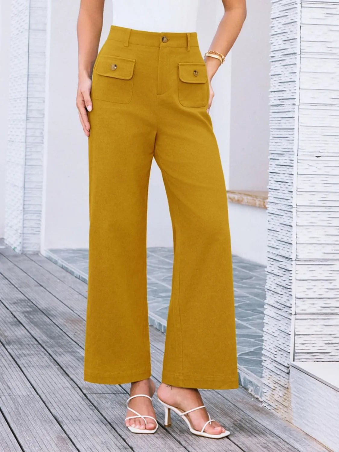 High waist wide leg pants with buttons and pockets.