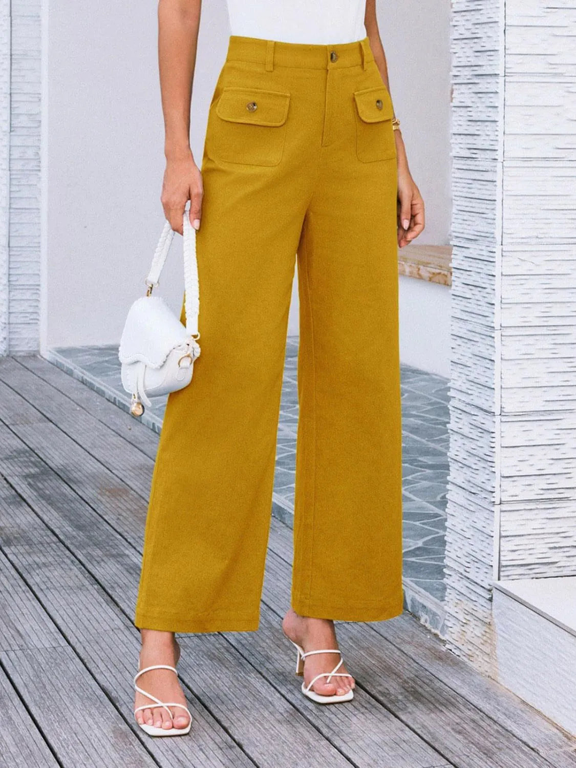 High waist wide leg pants with buttons and pockets.