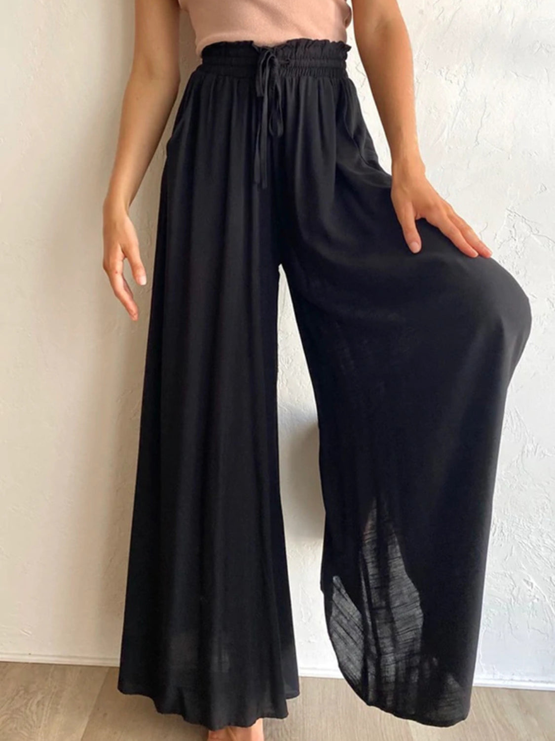 High waist wide leg pants with pockets, opaque.