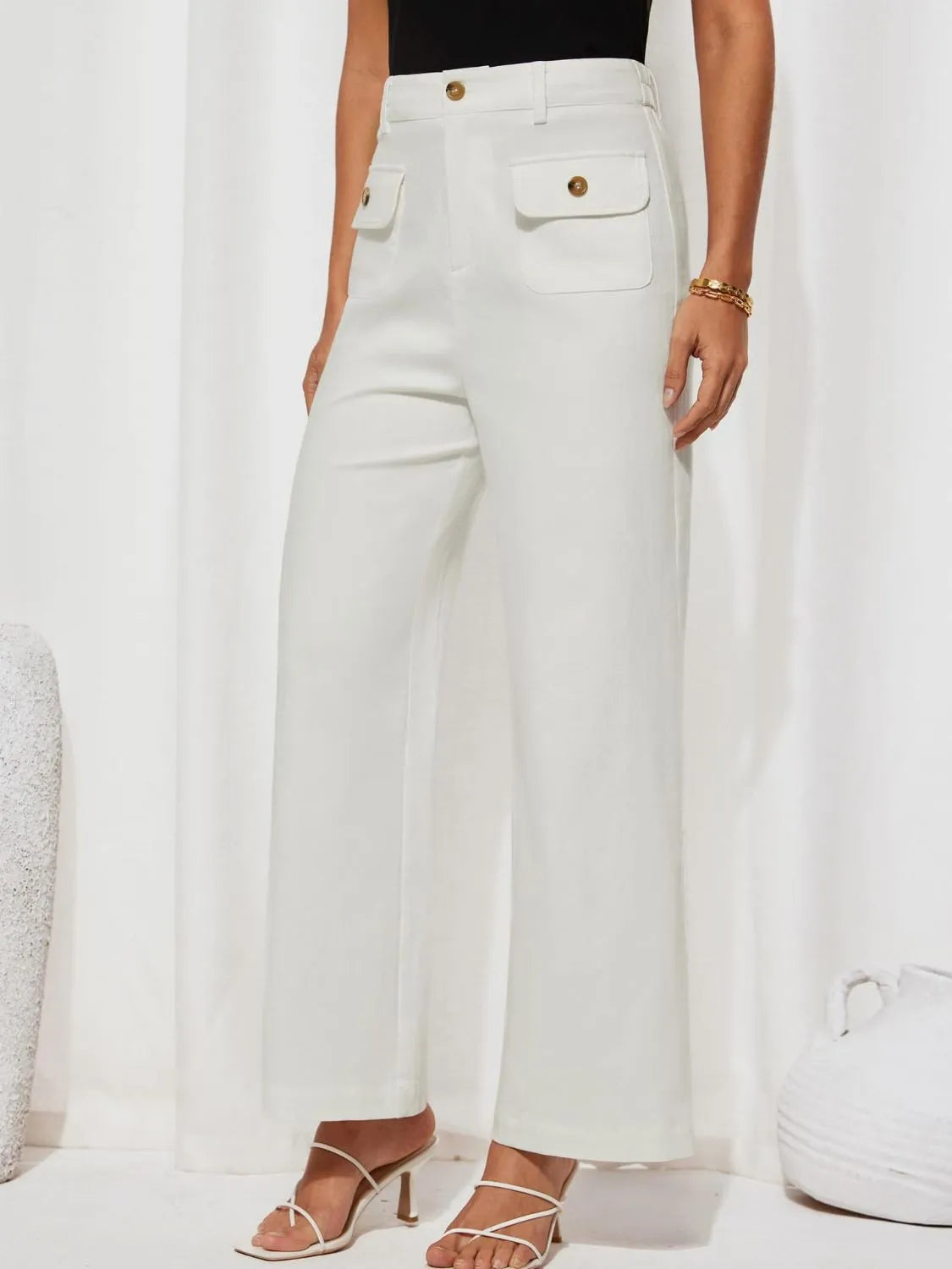 High waist wide leg pants with buttons and pockets.