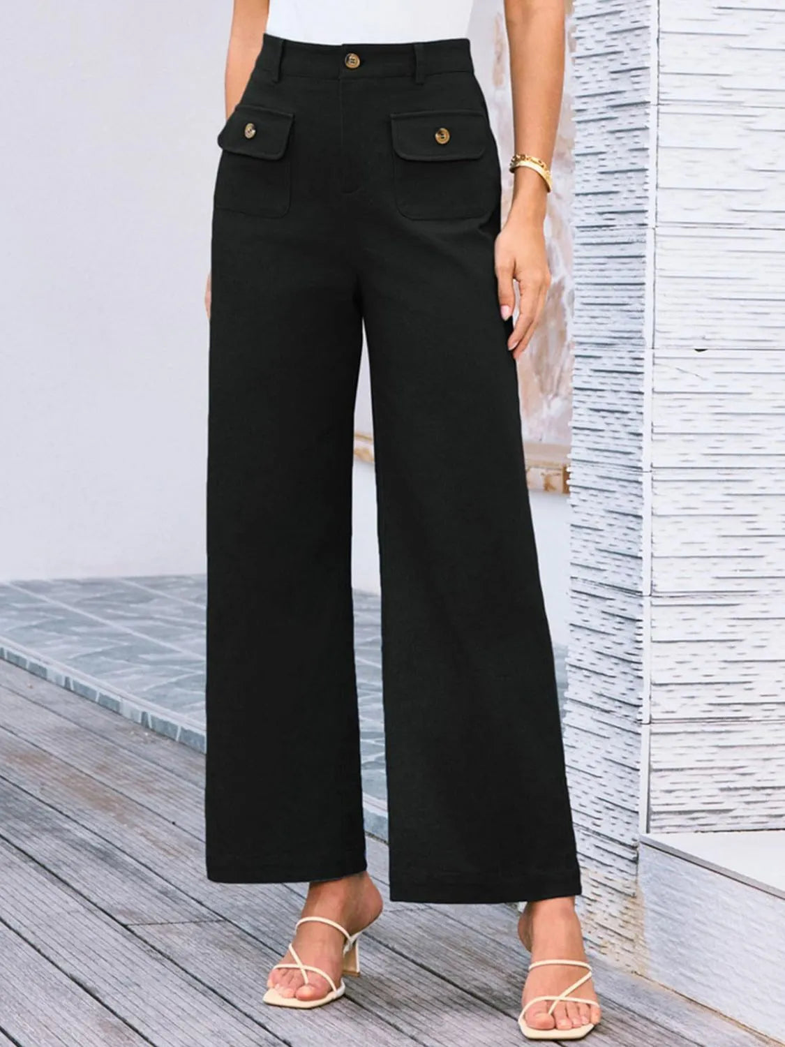 High waist wide leg pants with buttons and pockets.