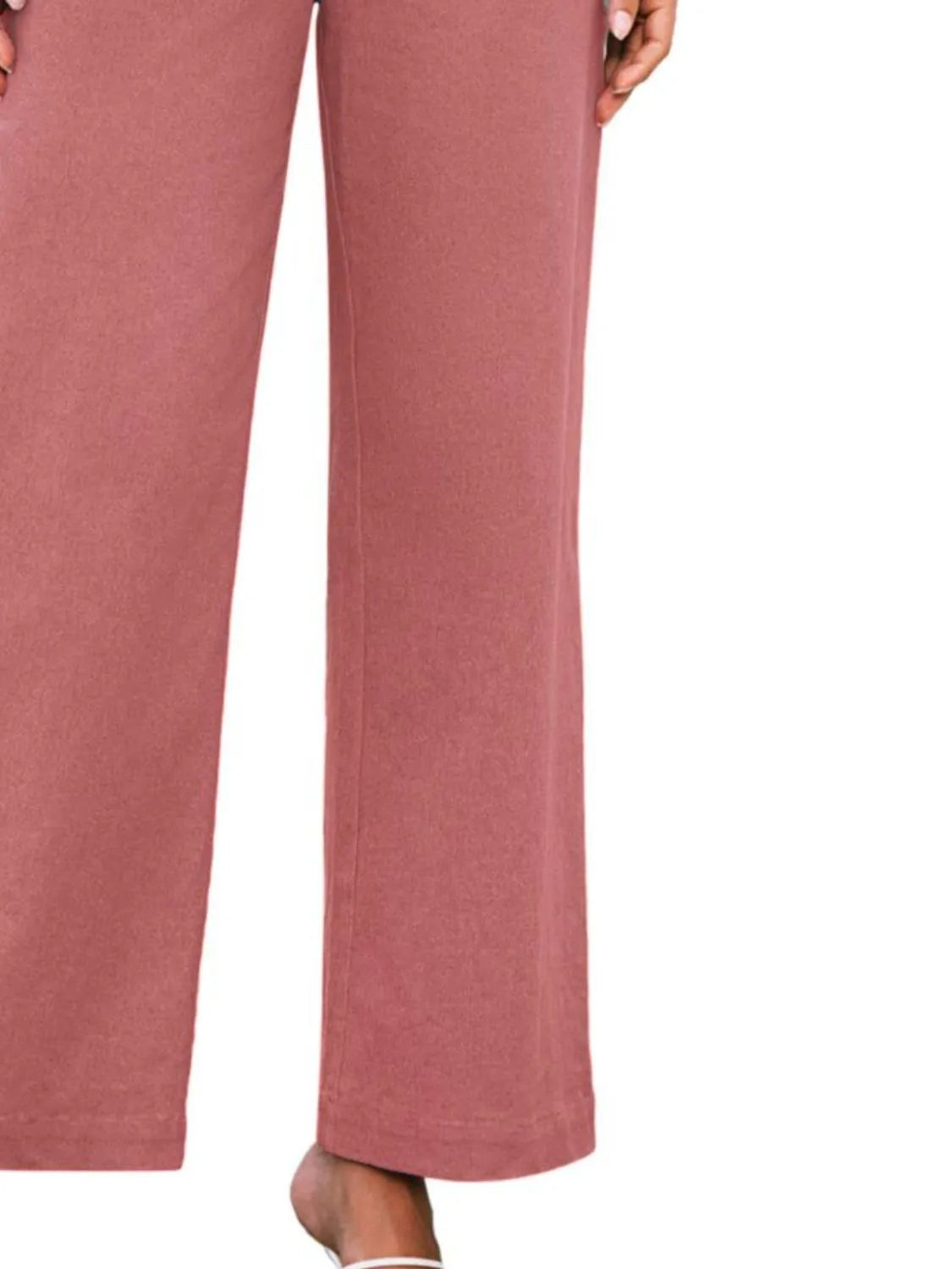 High waist wide leg pants with buttons and pockets.