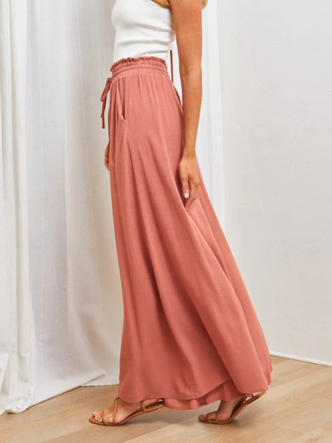 High waist wide leg pants with pockets, opaque.