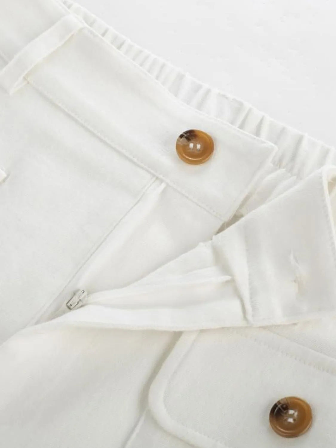 High waist wide leg pants with buttons and pockets.