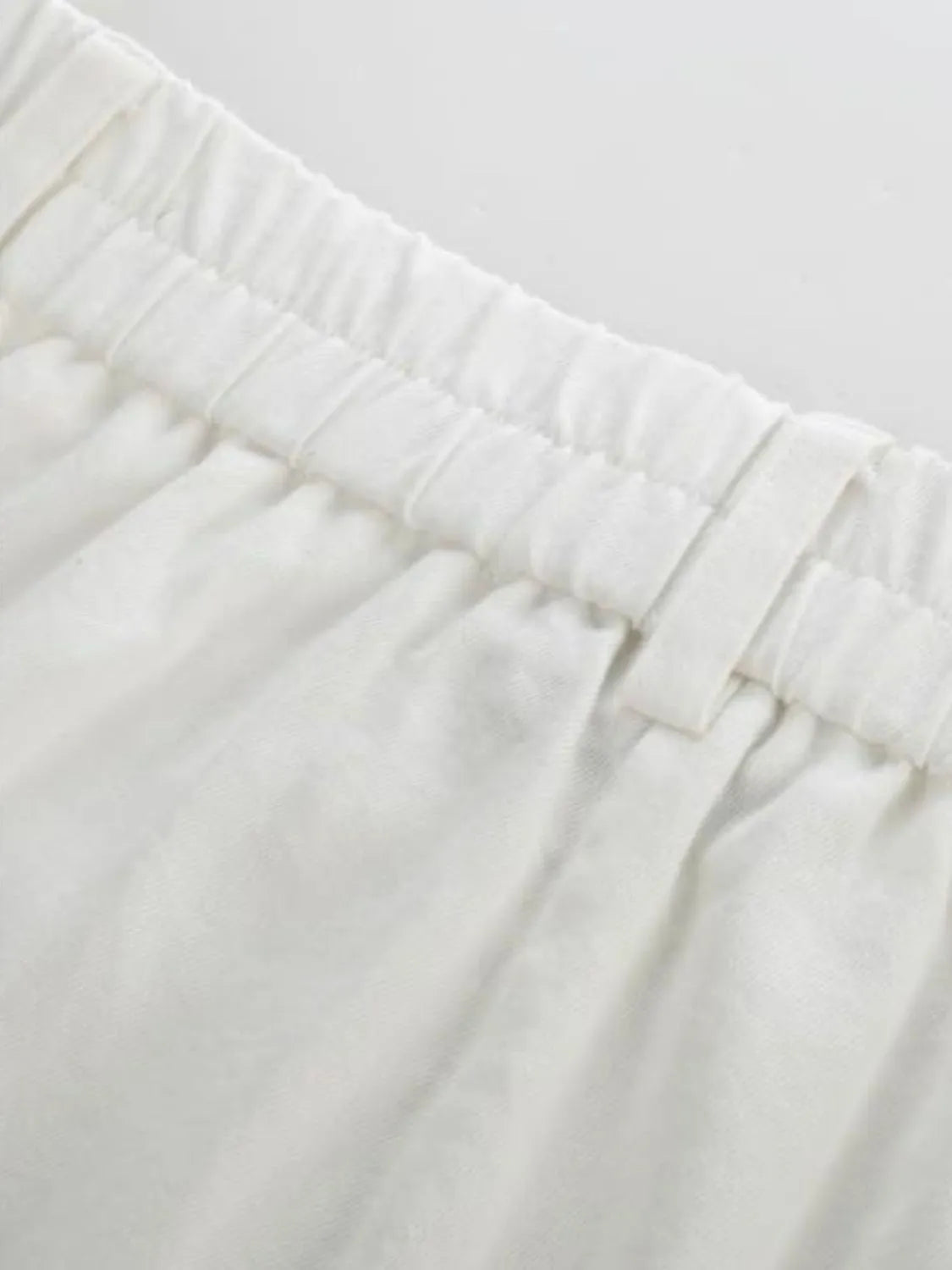 High waist wide leg pants with buttons and pockets.