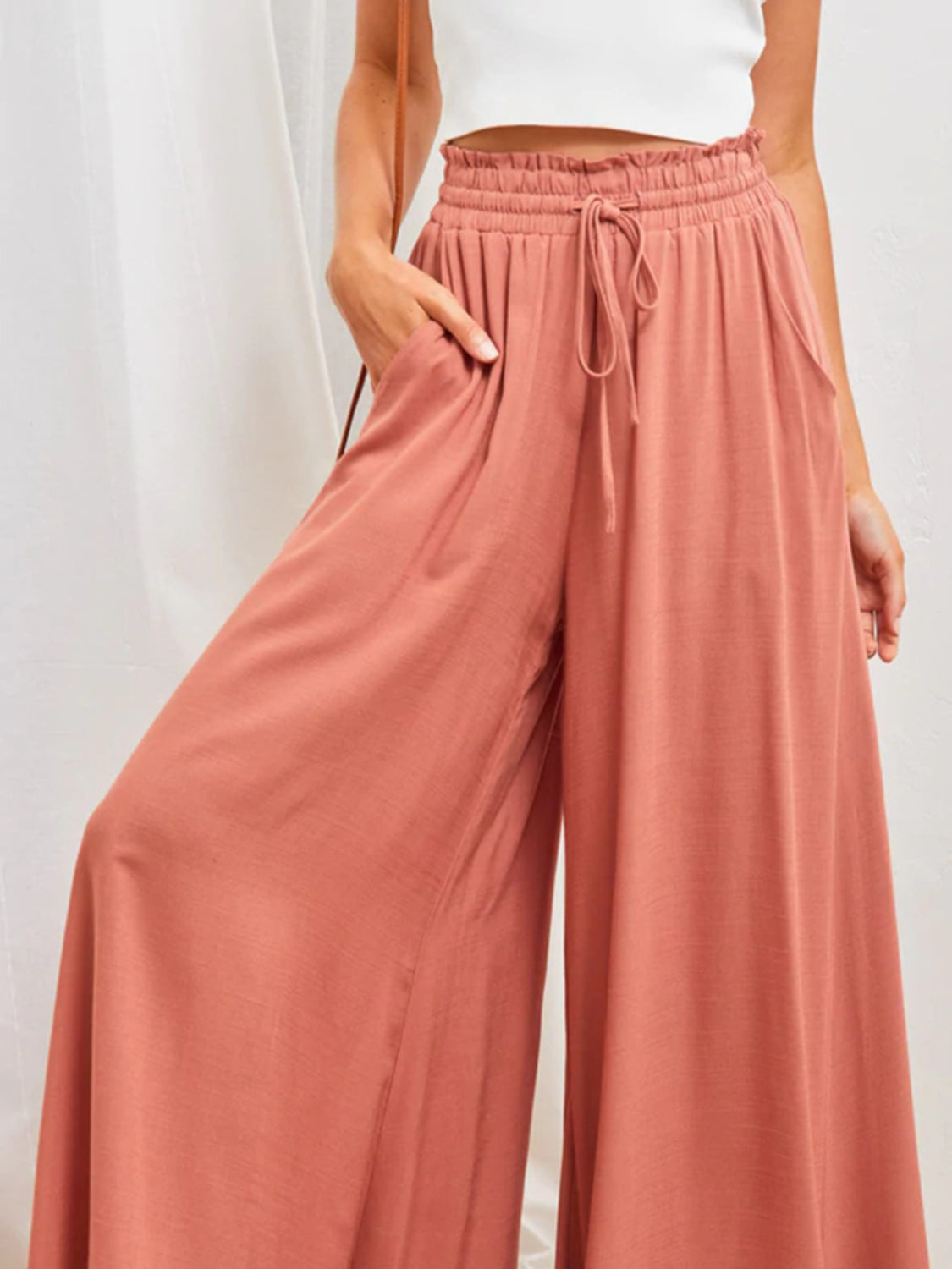 High waist wide leg pants with pockets, opaque.