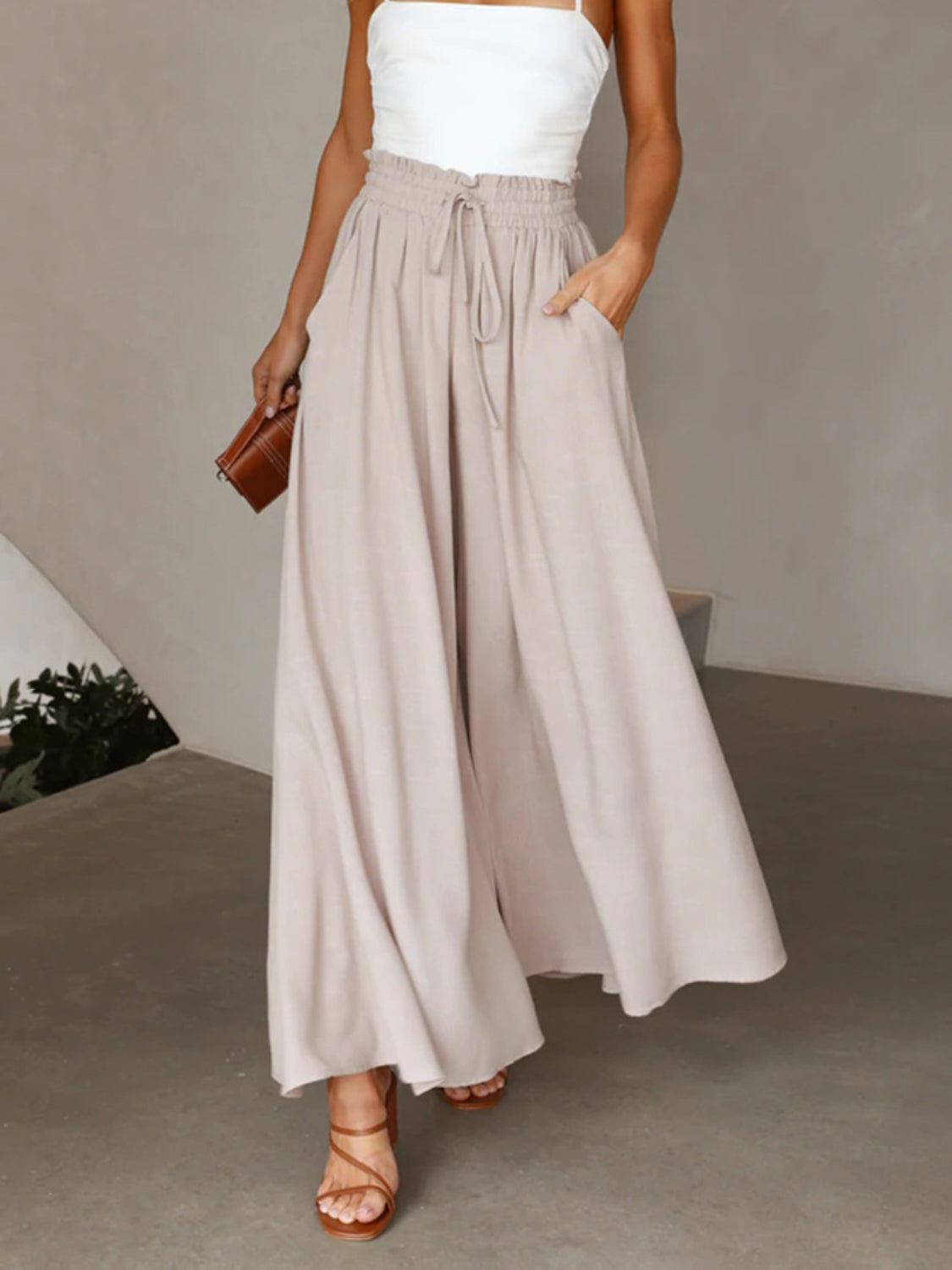 High waist wide leg pants with pockets, opaque.