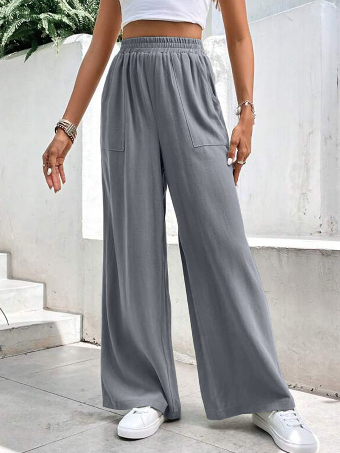 High waist wide leg pants with pockets, opaque.