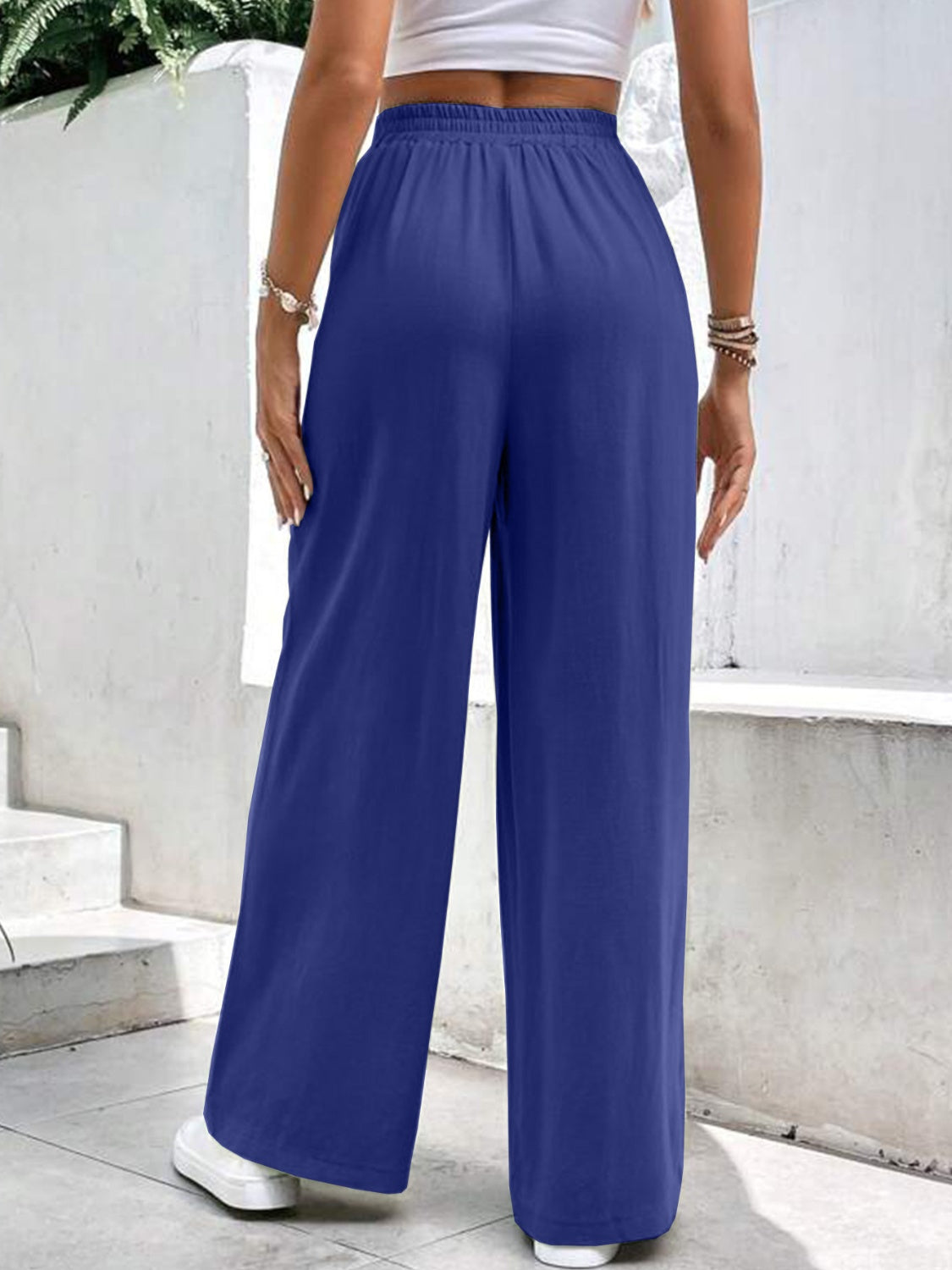 High waist wide leg pants with pockets, opaque.