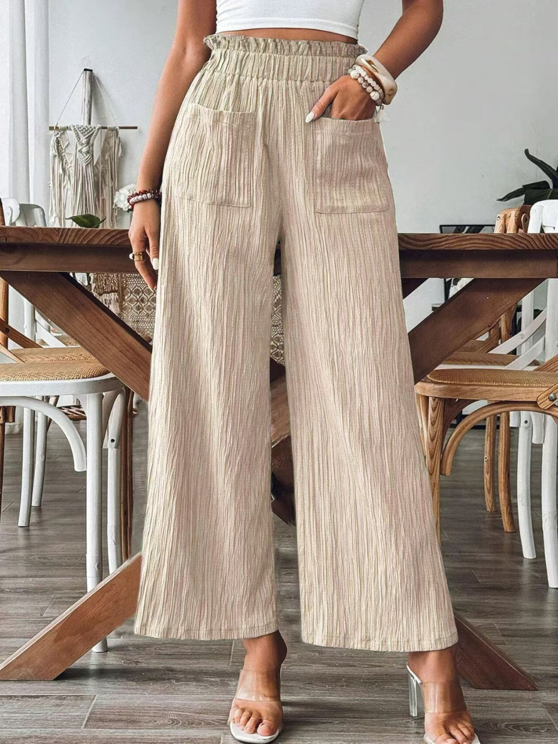 High waist wide leg pants with smocking and pockets, opaque.