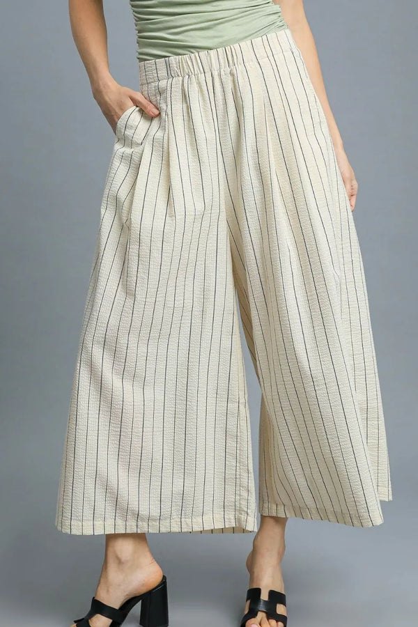 High-waisted wide leg striped pants with pockets.