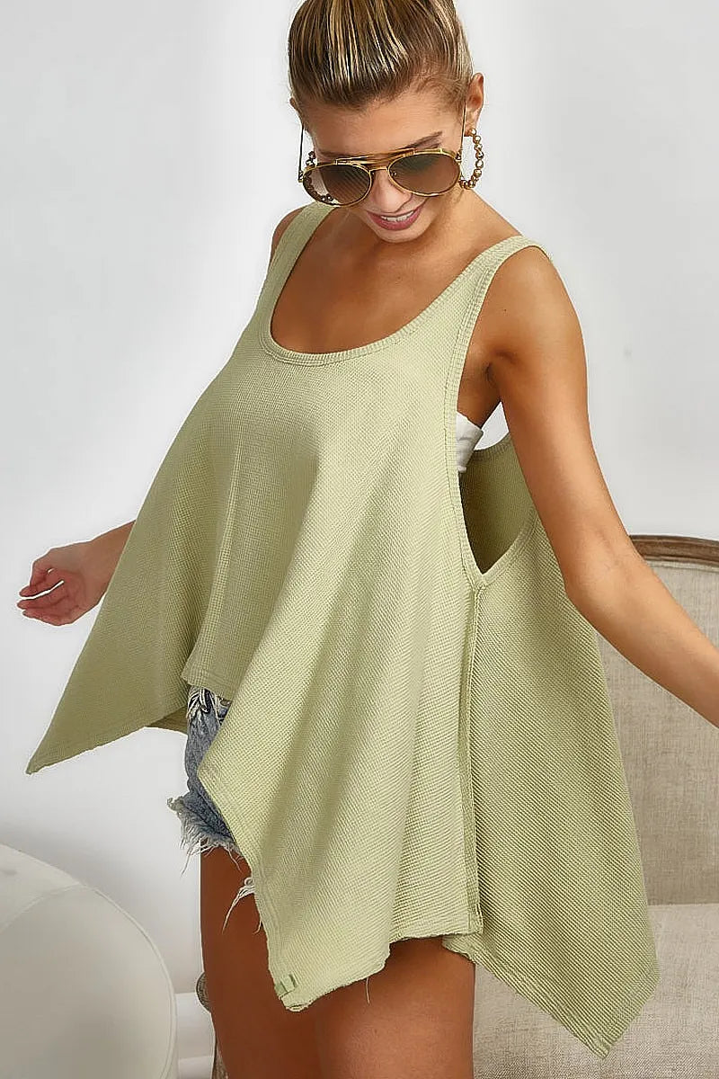 High and low flare knit tank top with oversized asymmetrical design, slightly stretchy.