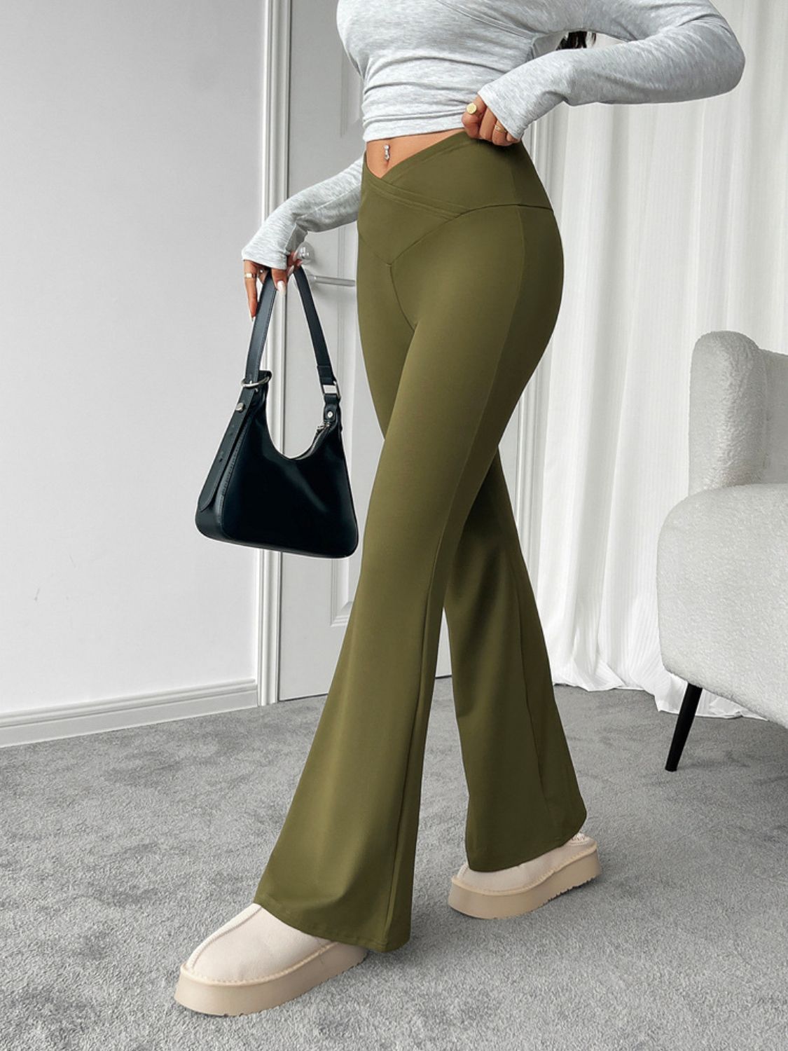 Highly stretchy bootcut pants, opaque.