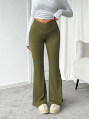 Highly stretchy bootcut pants, opaque.