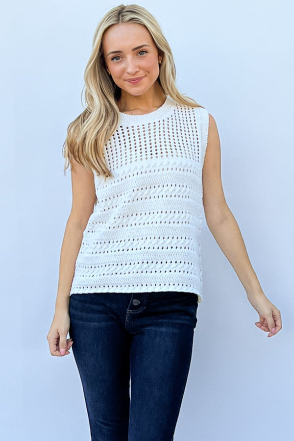 Hollowed out buttoned tank in ivory with eyelet detail, semi-sheer.