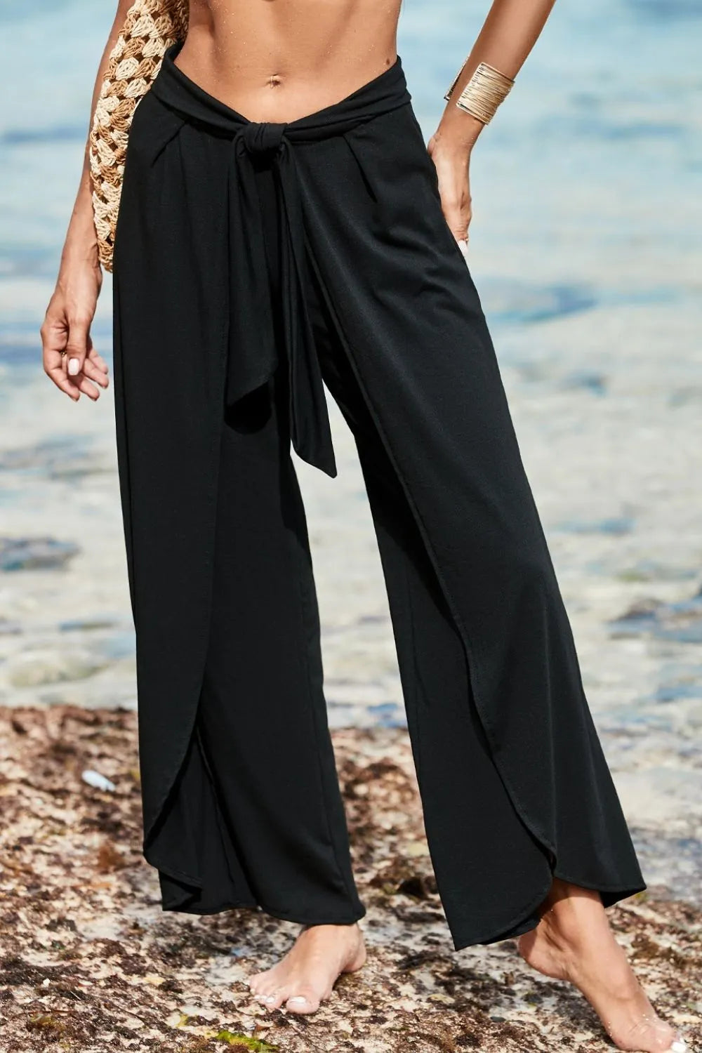 Knotted waist split leg relaxed pants with tie.