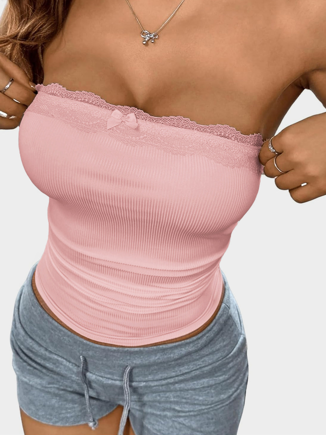 Lace detail bow tube top, opaque and highly stretchy.