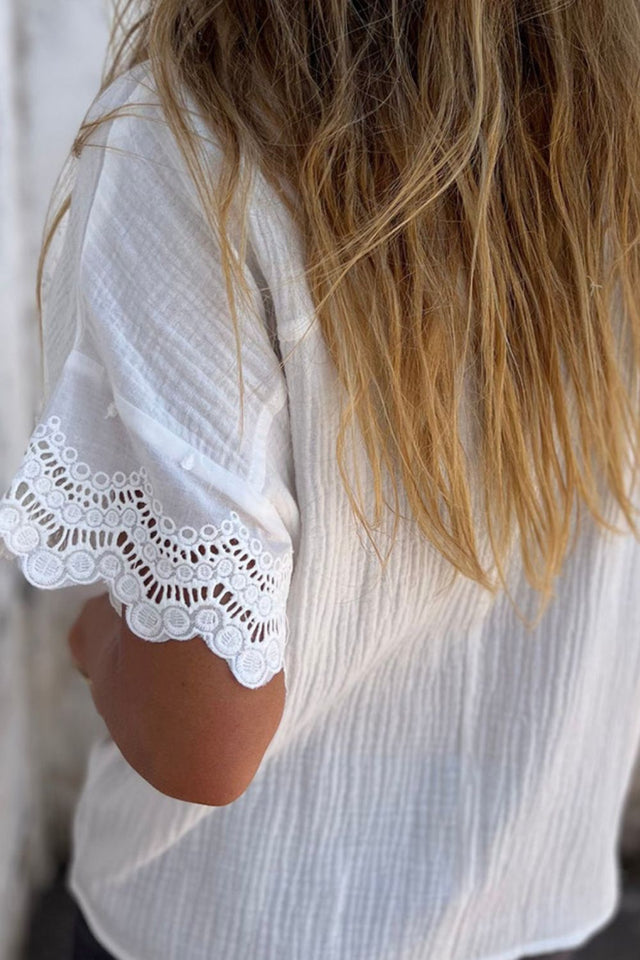 Lace detail collared neck short sleeve blouse.