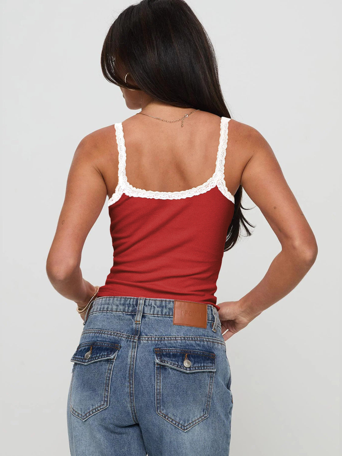 Cropped cami with lace detail.