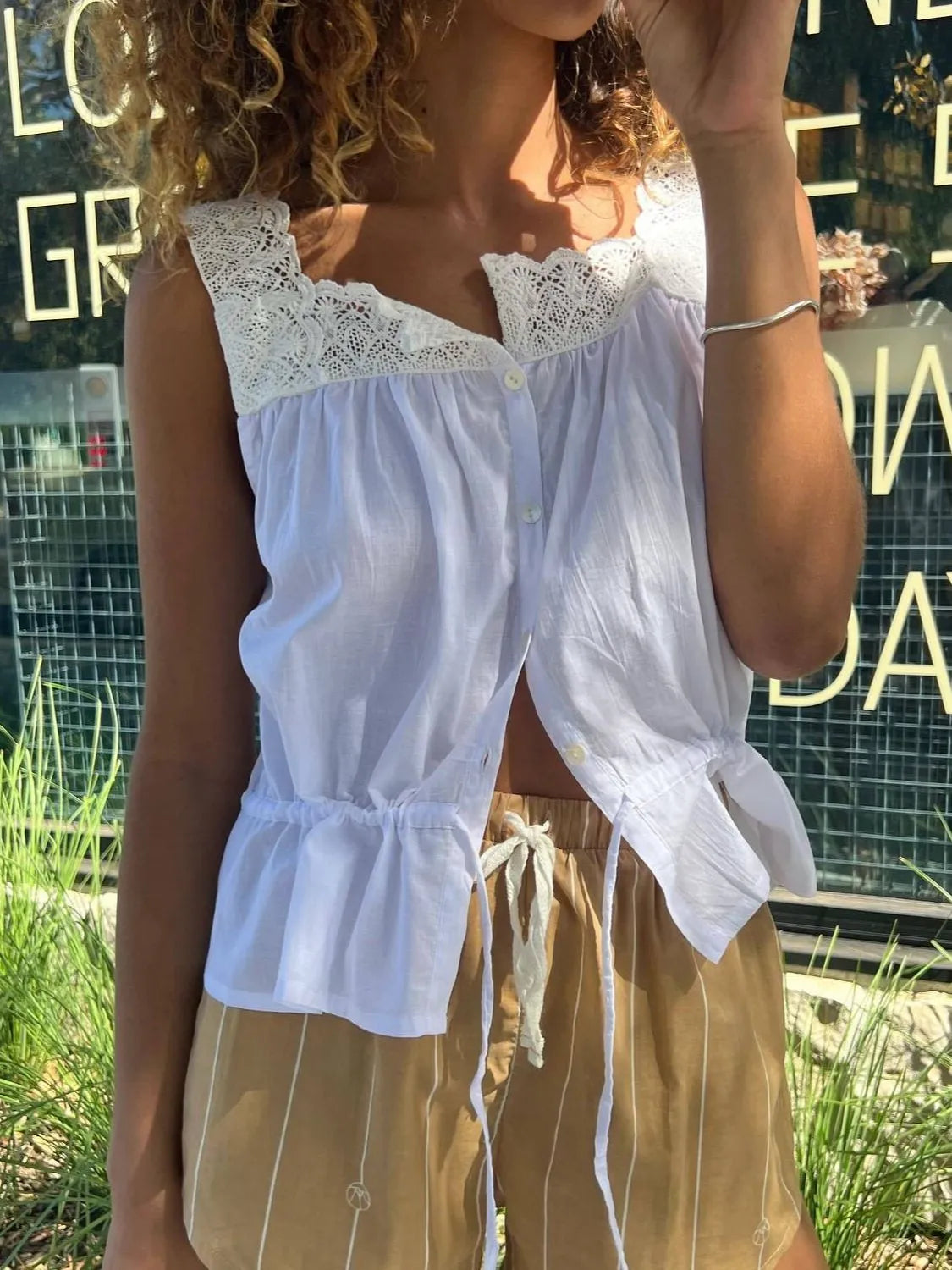 Lace detail drawstring tank with button details.