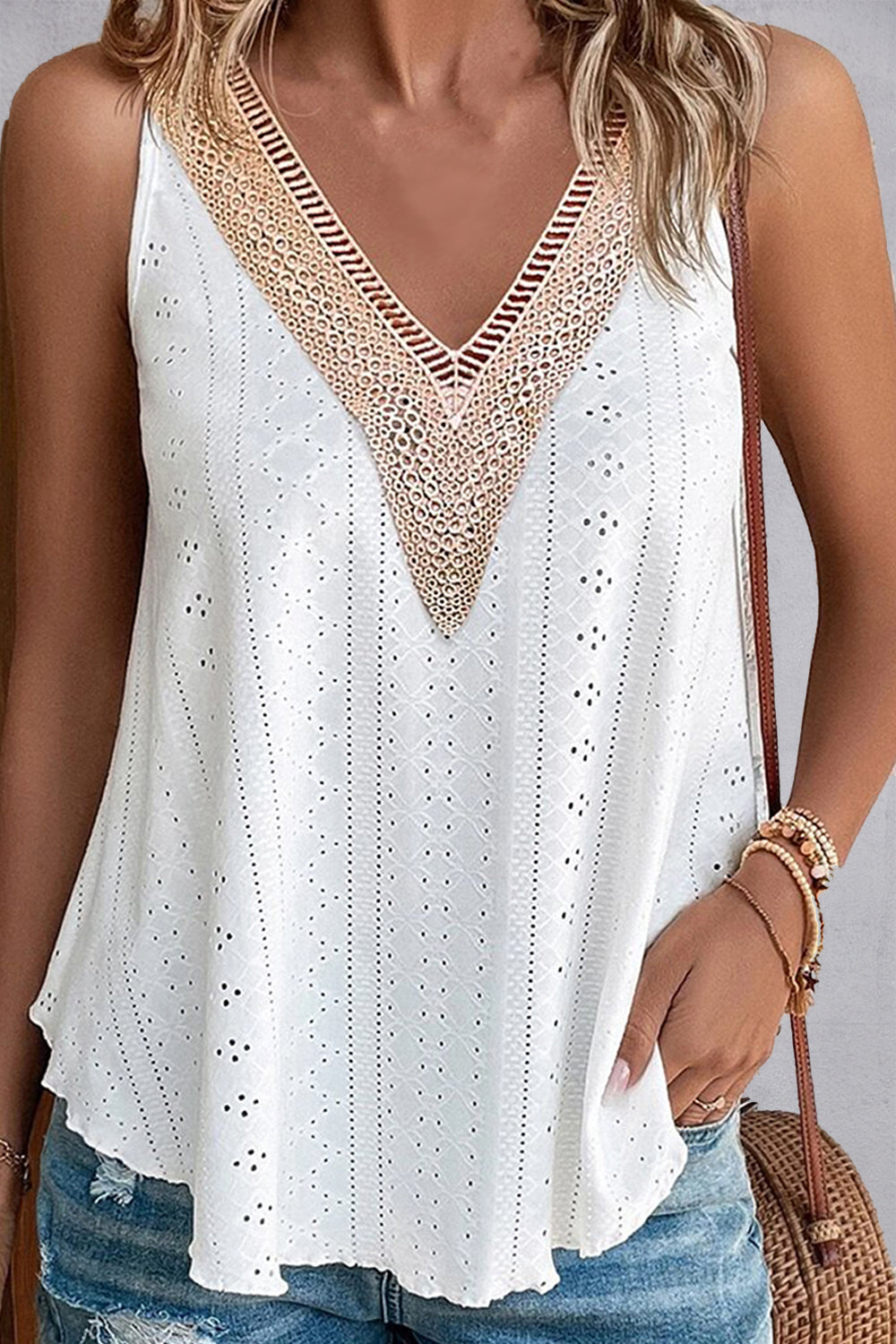 Lace detail eyelet V-neck tank top.