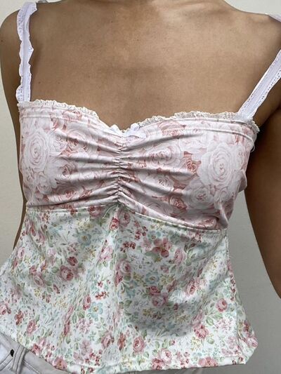 Floral sweetheart neck cami with lace detail, tied back, and bow.