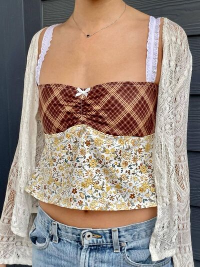 Floral sweetheart neck cami with lace detail, tied back, and bow.