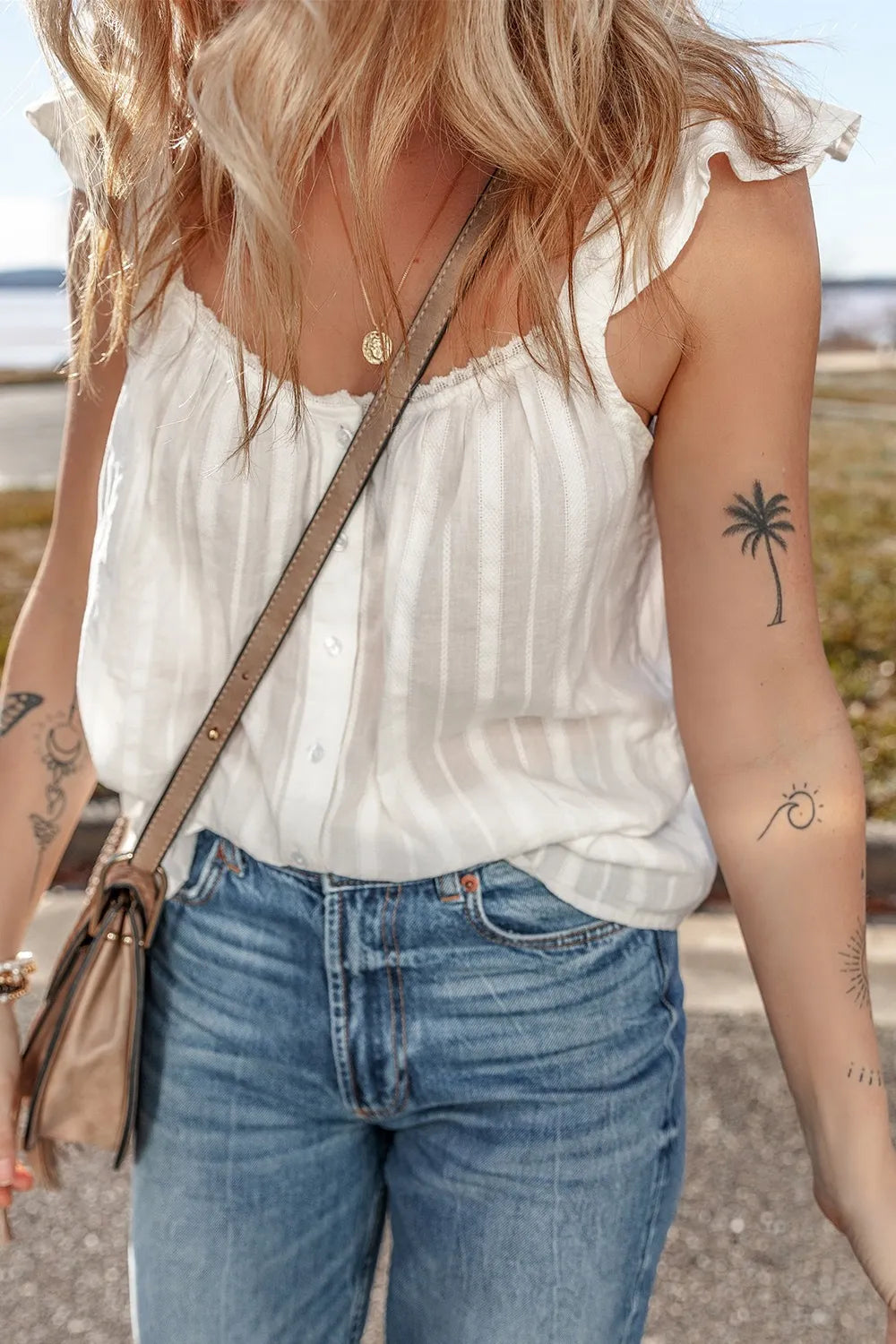Lace detail ruffled buttoned loose fit tank top.