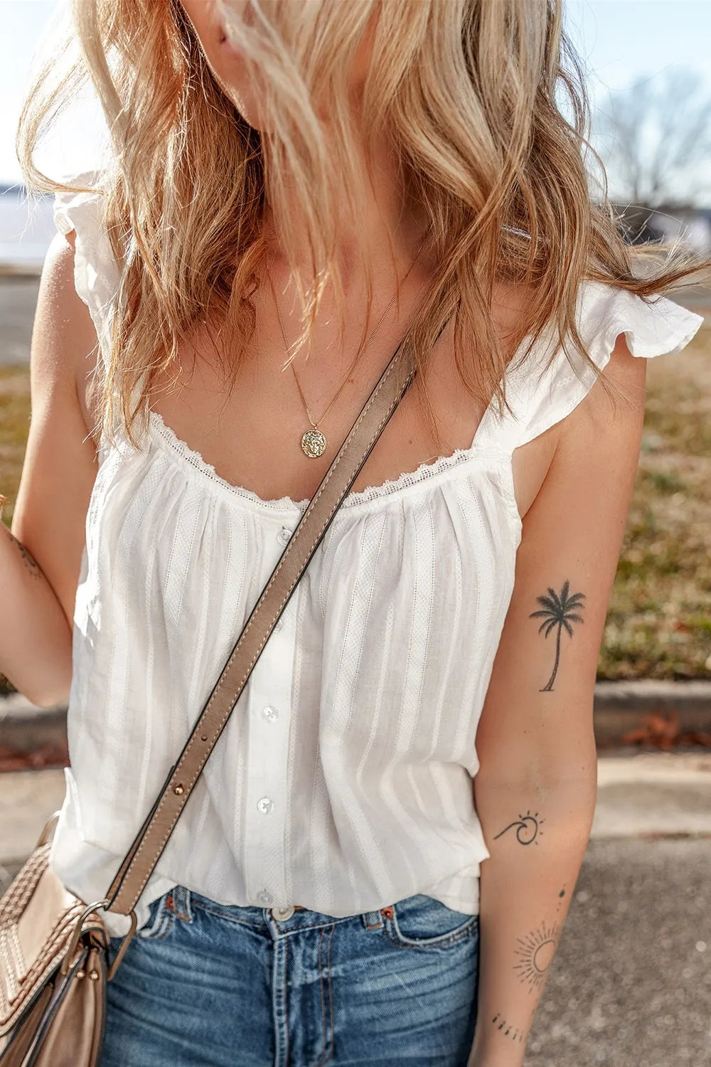 Lace detail ruffled buttoned loose fit tank top.