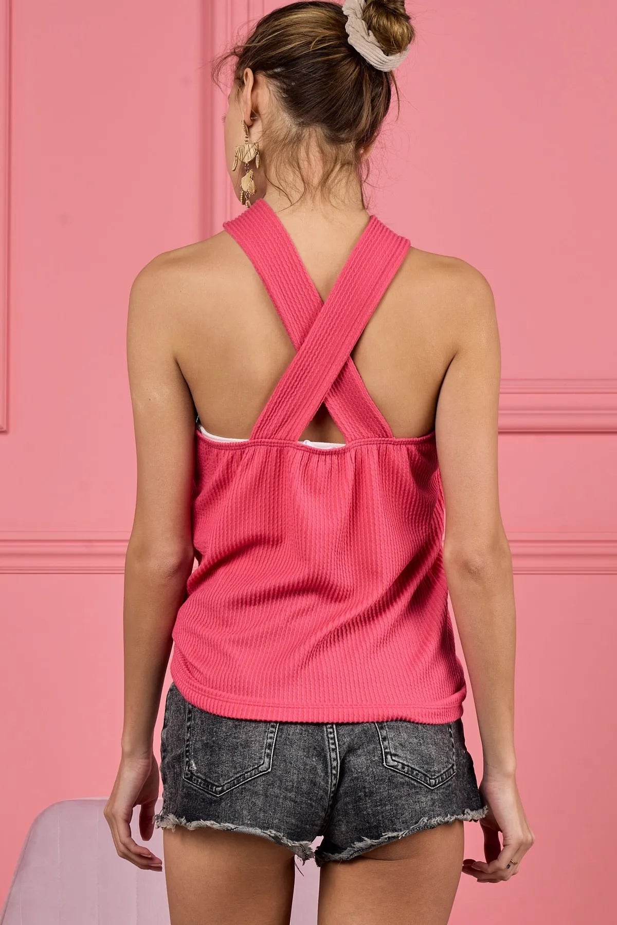 Lace knit top with cut out and cross neck banded detail, slightly stretchy.