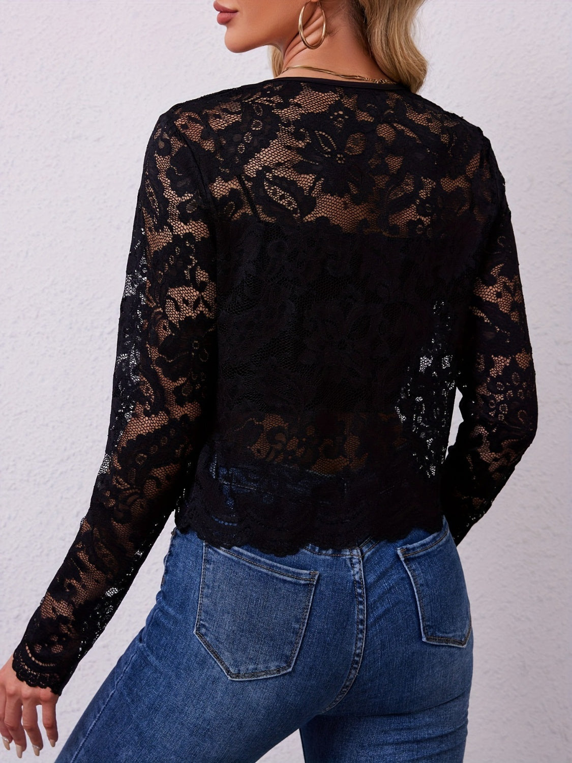 Lace open front long sleeve jacket.