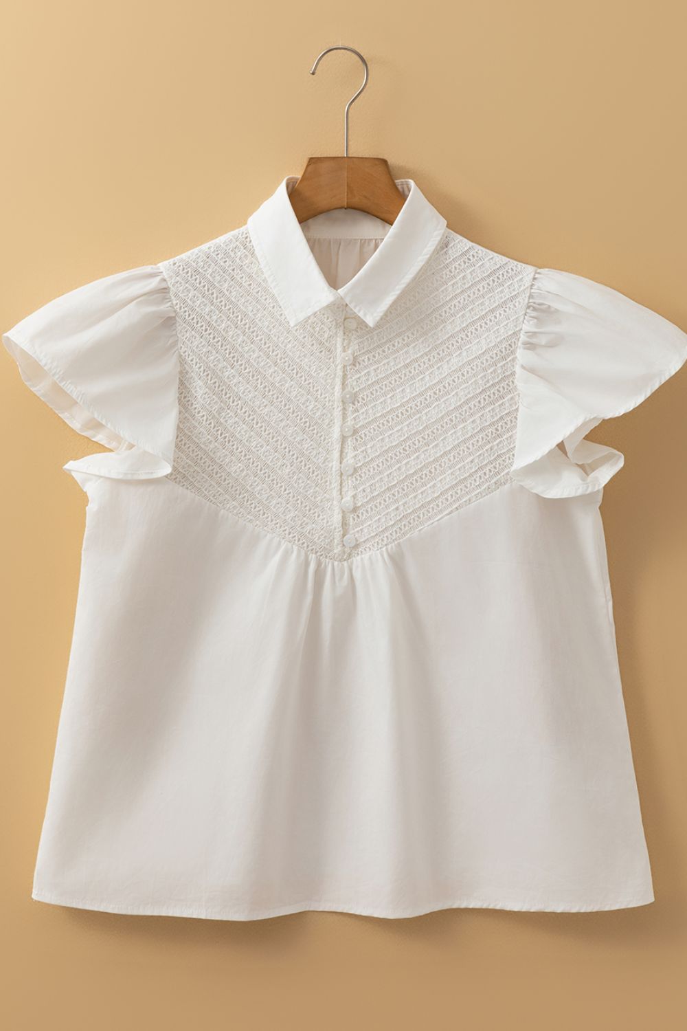 Lace Patchwork Ruffled Cap Sleeve Blouse with Buttoned Details.