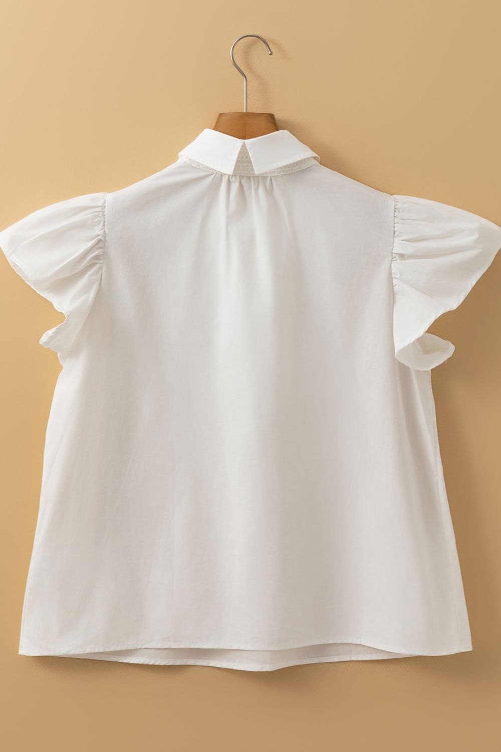 Lace Patchwork Ruffled Cap Sleeve Blouse with Buttoned Details.